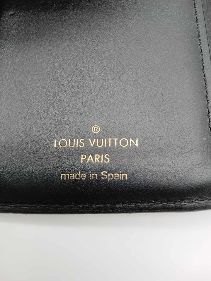 LOUIS VUITTON Monogram Reverse Dauphine Trifold Wallet