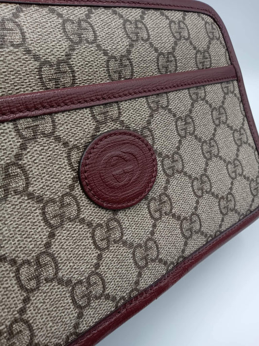 GUCCI Supreme Canvas Clutch