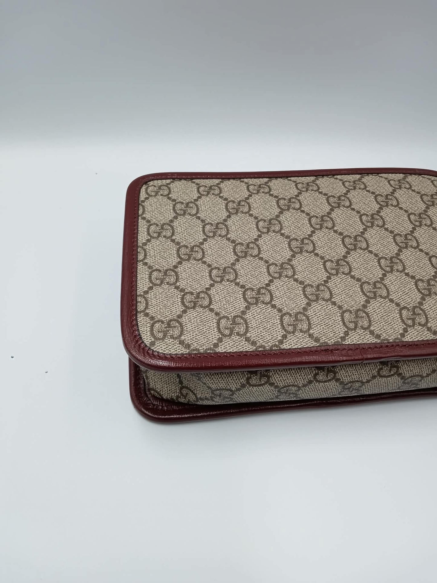 GUCCI Supreme Canvas Clutch