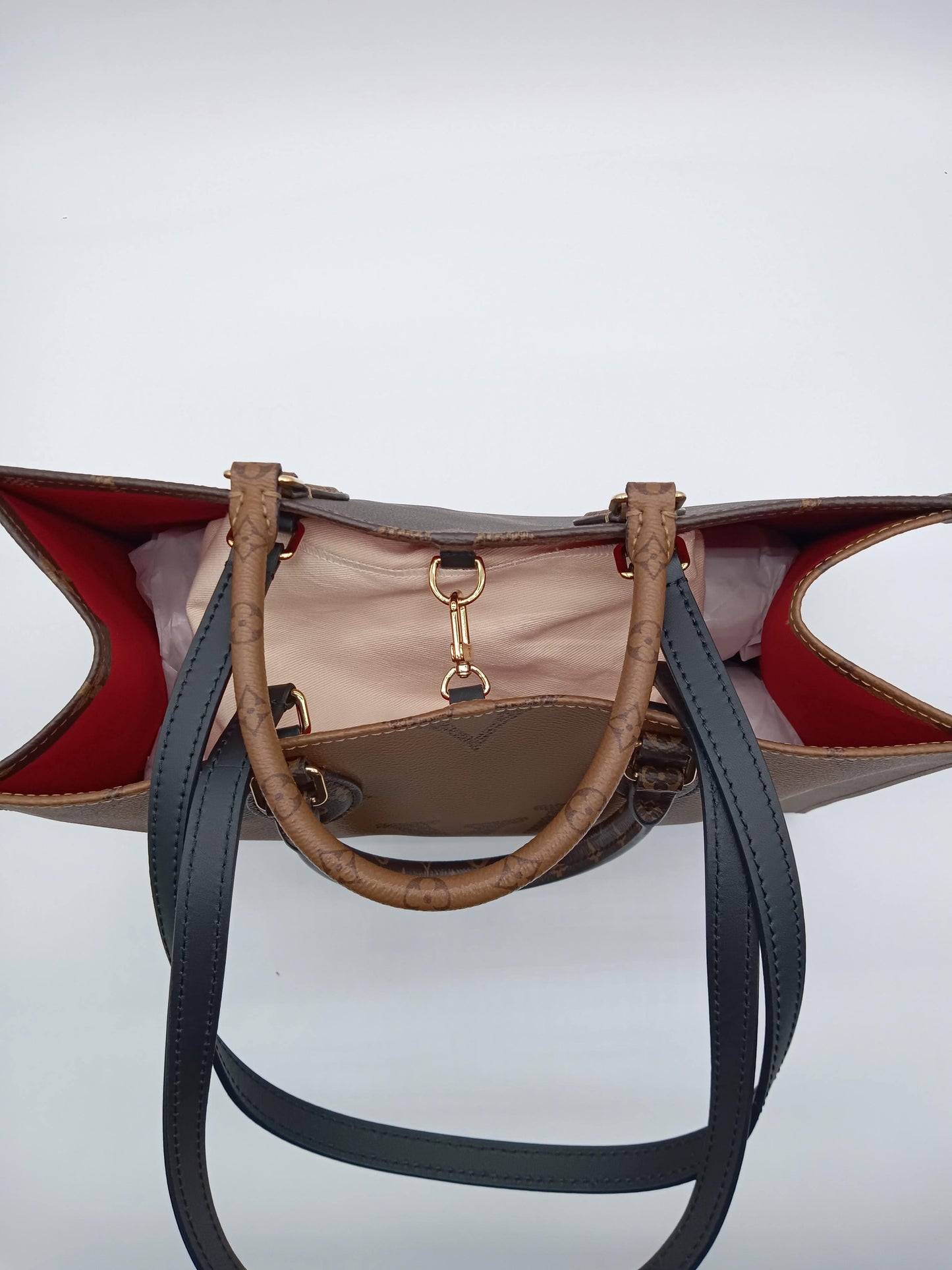 LOUIS VUITTON Reverse Monogram OTG MM
