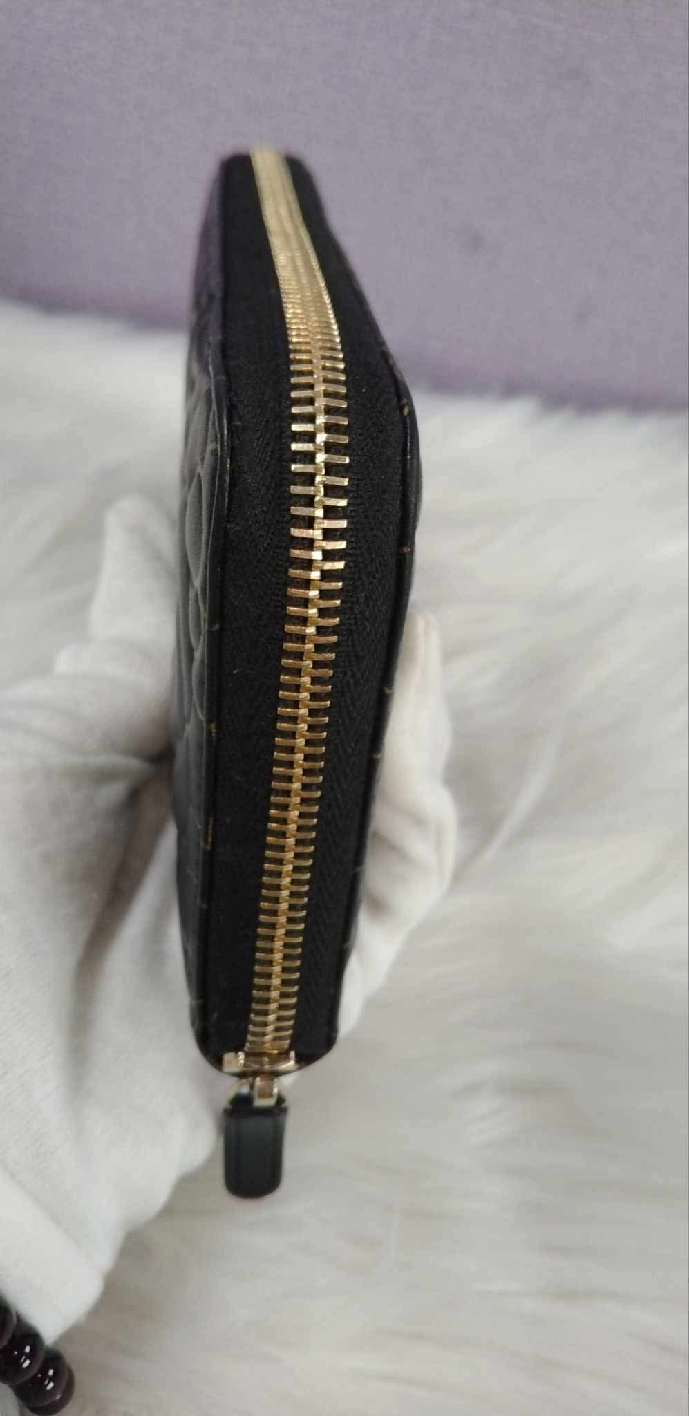 CHANEL Camellia Zippy Wallet