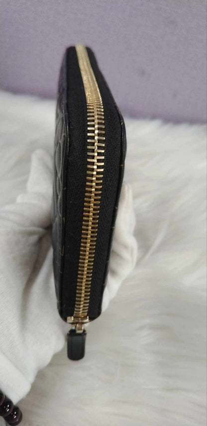 CHANEL Camellia Zippy Wallet