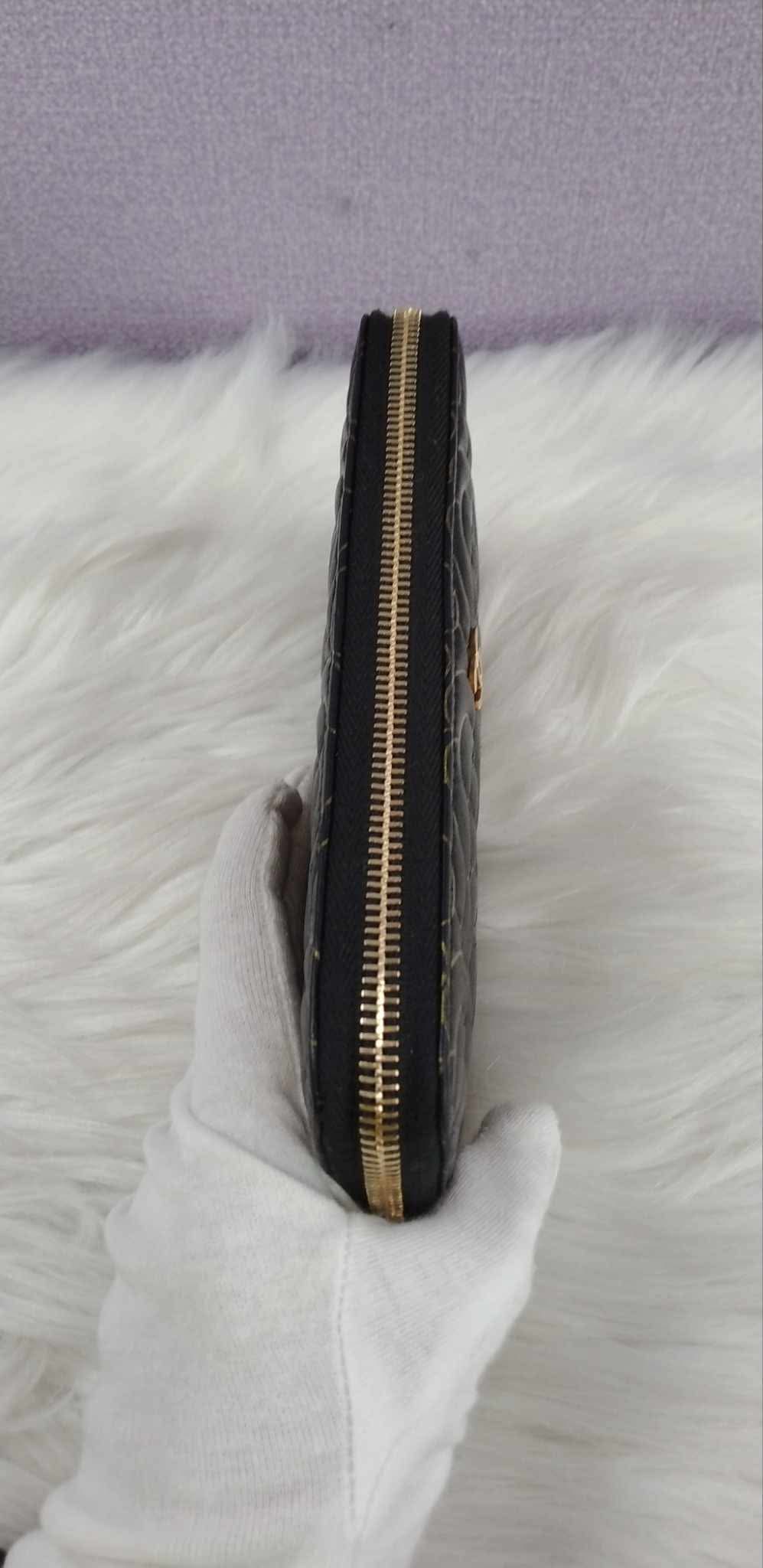 CHANEL Camellia Zippy Wallet