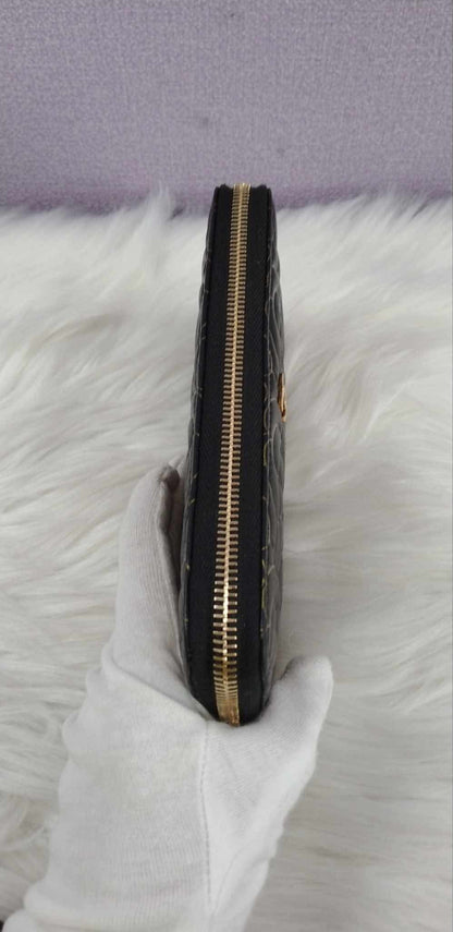 CHANEL Camellia Zippy Wallet