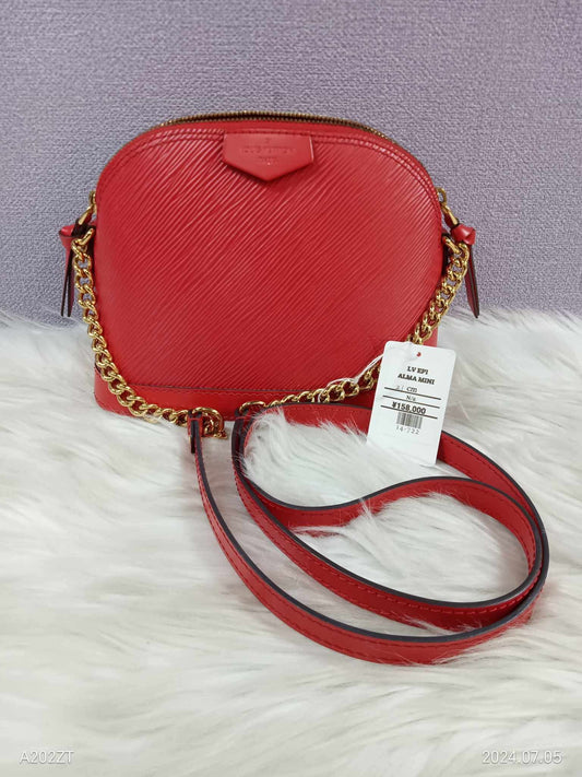 LOUIS VUITTON Epi Alma Mini