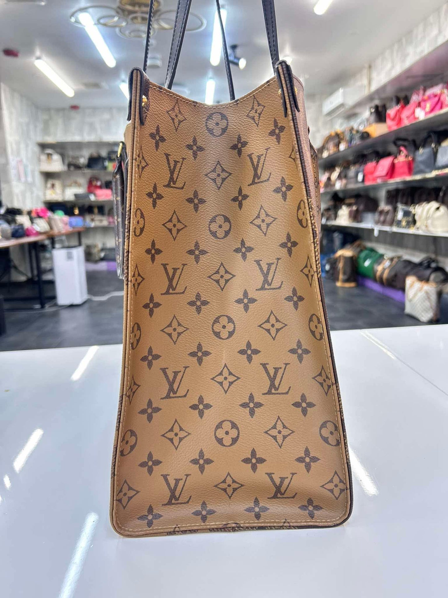 LOUIS VUITTON Monogram Reverse On The Go GM