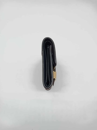LOUIS VUITTON Monogram Reverse Dauphine Trifold Wallet