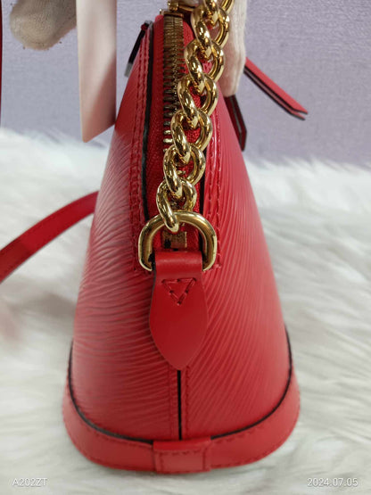 LOUIS VUITTON Epi Alma Mini