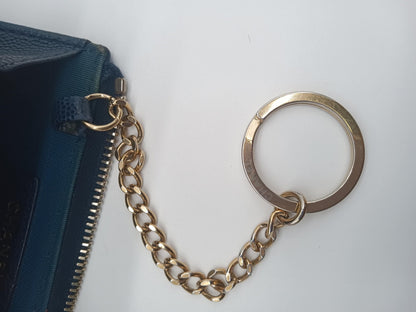 CHANEL Caviar Camella Embossed Key Coin Purse