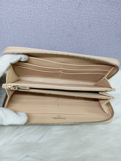 CHANEL Lambskin Matelasse Zippy Wallet
