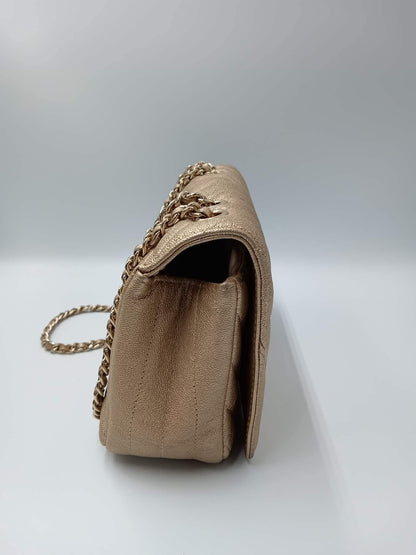 CHANEL Caviar Chevron Mini Statement Metallic Flap
