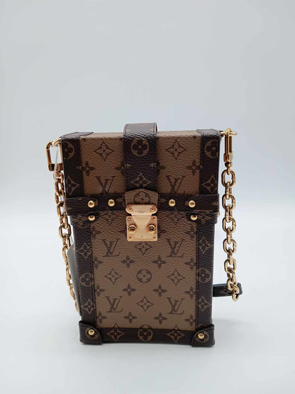 LOUYIS VUITTON Monogram Reverse Pochette Trunk Vertical
