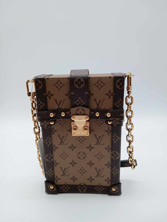 LOUYIS VUITTON Monogram Reverse Pochette Trunk Vertical