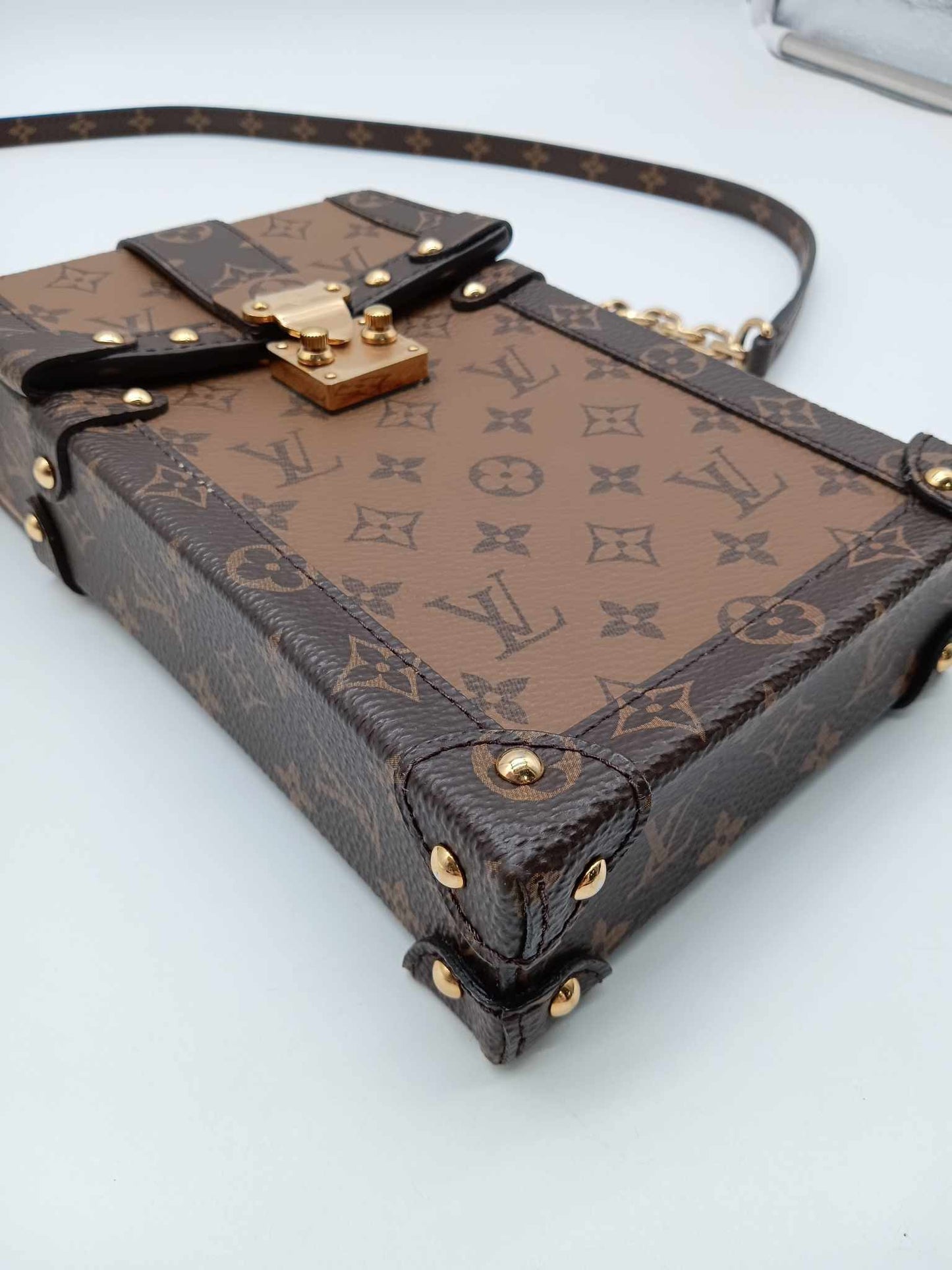LOUYIS VUITTON Monogram Reverse Pochette Trunk Vertical