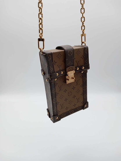 LOUYIS VUITTON Monogram Reverse Pochette Trunk Vertical