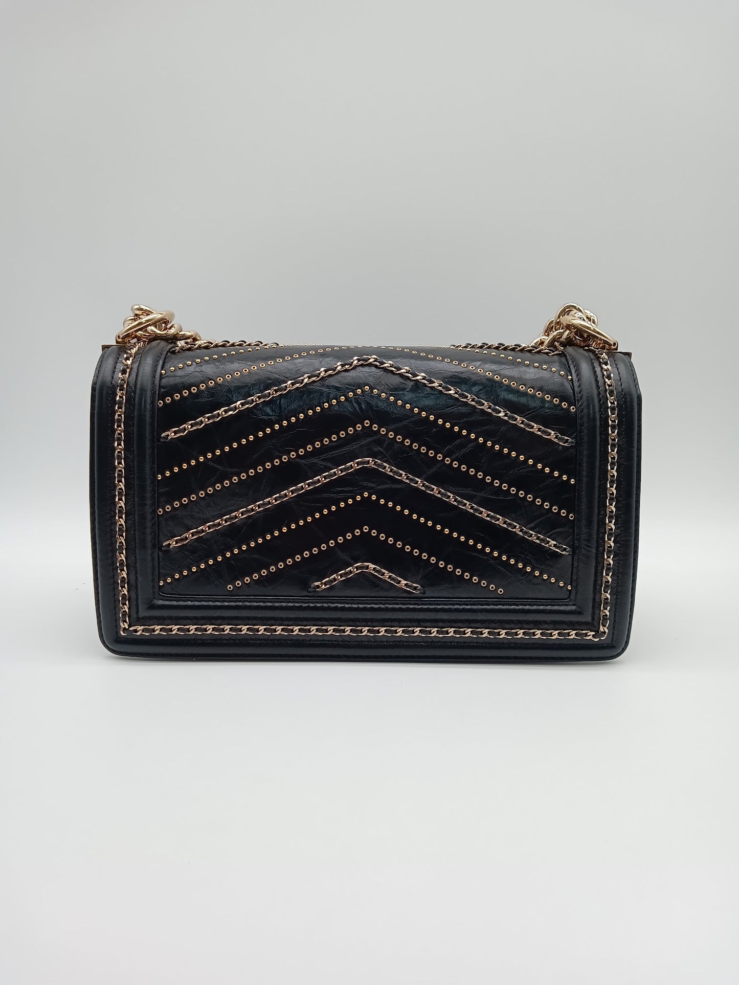CHANEL Studded Calfskin Chevron Leboy