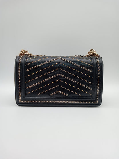 CHANEL Studded Calfskin Chevron Leboy