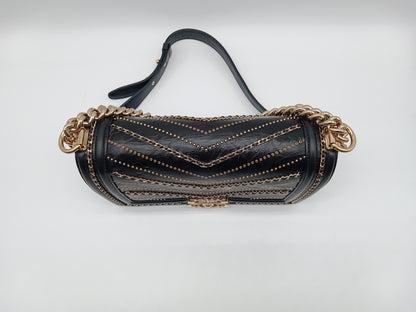 CHANEL Studded Calfskin Chevron Leboy