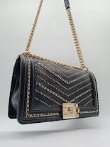 CHANEL Studded Calfskin Chevron Leboy