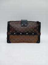 LOUIS VUITTON Monogram Reverse Trunk Clutch