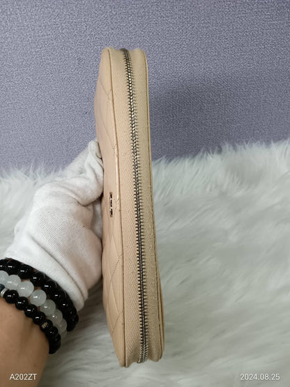 CHANEL Lambskin Matelasse Zippy Wallet