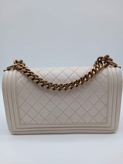 CHANEL Shiny Caviar Quilted Leboy