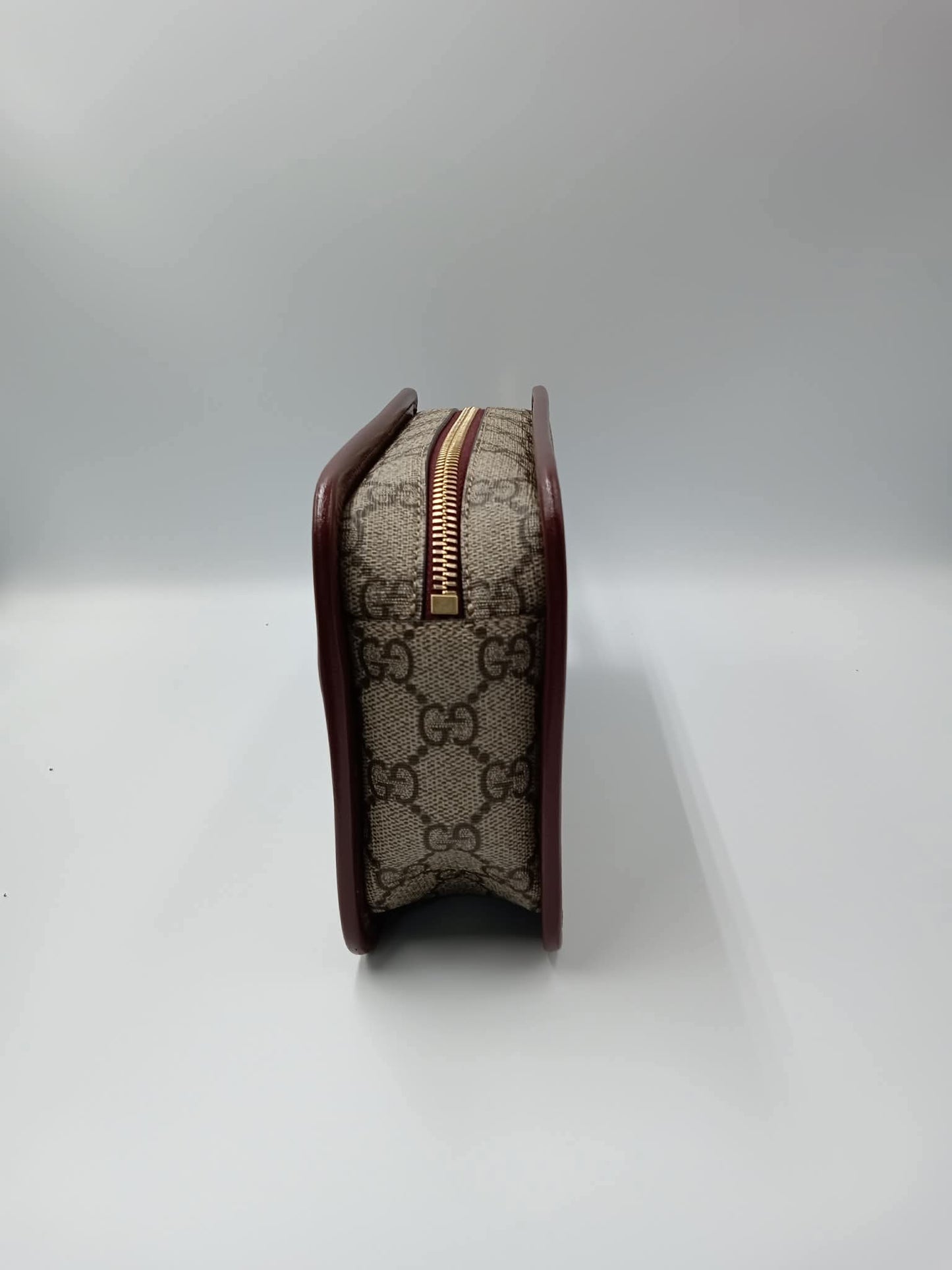 GUCCI Supreme Canvas Clutch