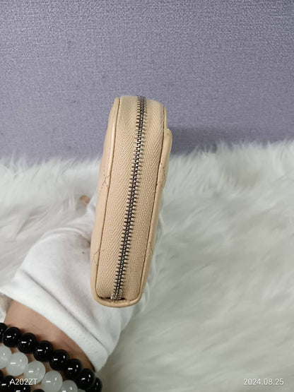 CHANEL Lambskin Matelasse Zippy Wallet
