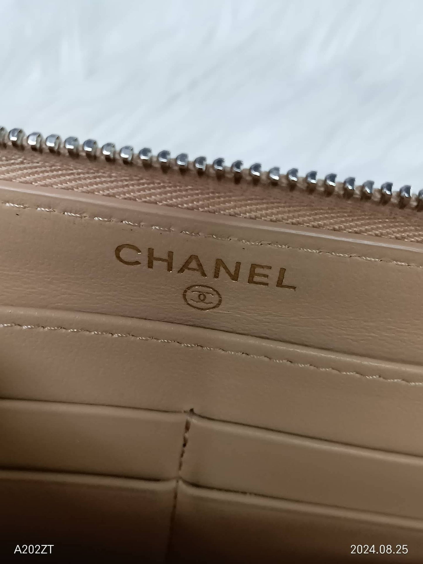 CHANEL Lambskin Matelasse Zippy Wallet
